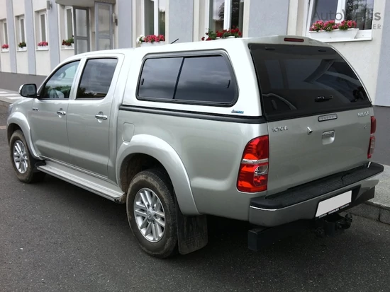 Aeroklas Stylish felépítmény - csúsztatható oldalüveg - központi zár nélkül - <span style="color:#FFA500;">alapozott</span> - Toyota D/C 2005-2015